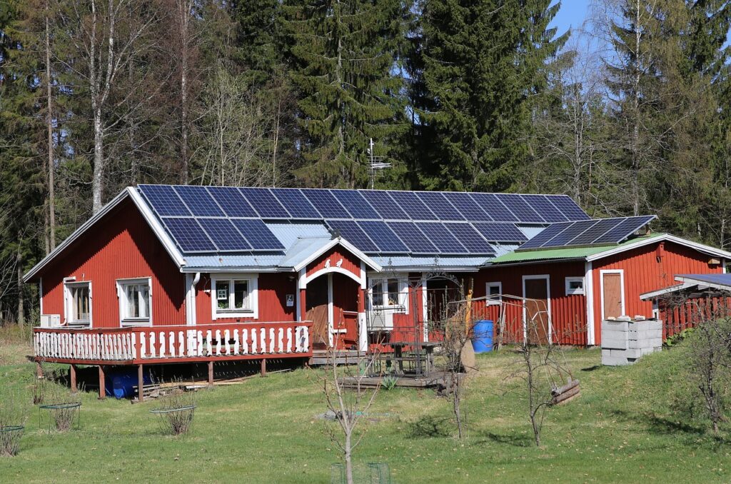 farmhouse with solar panels on the roof